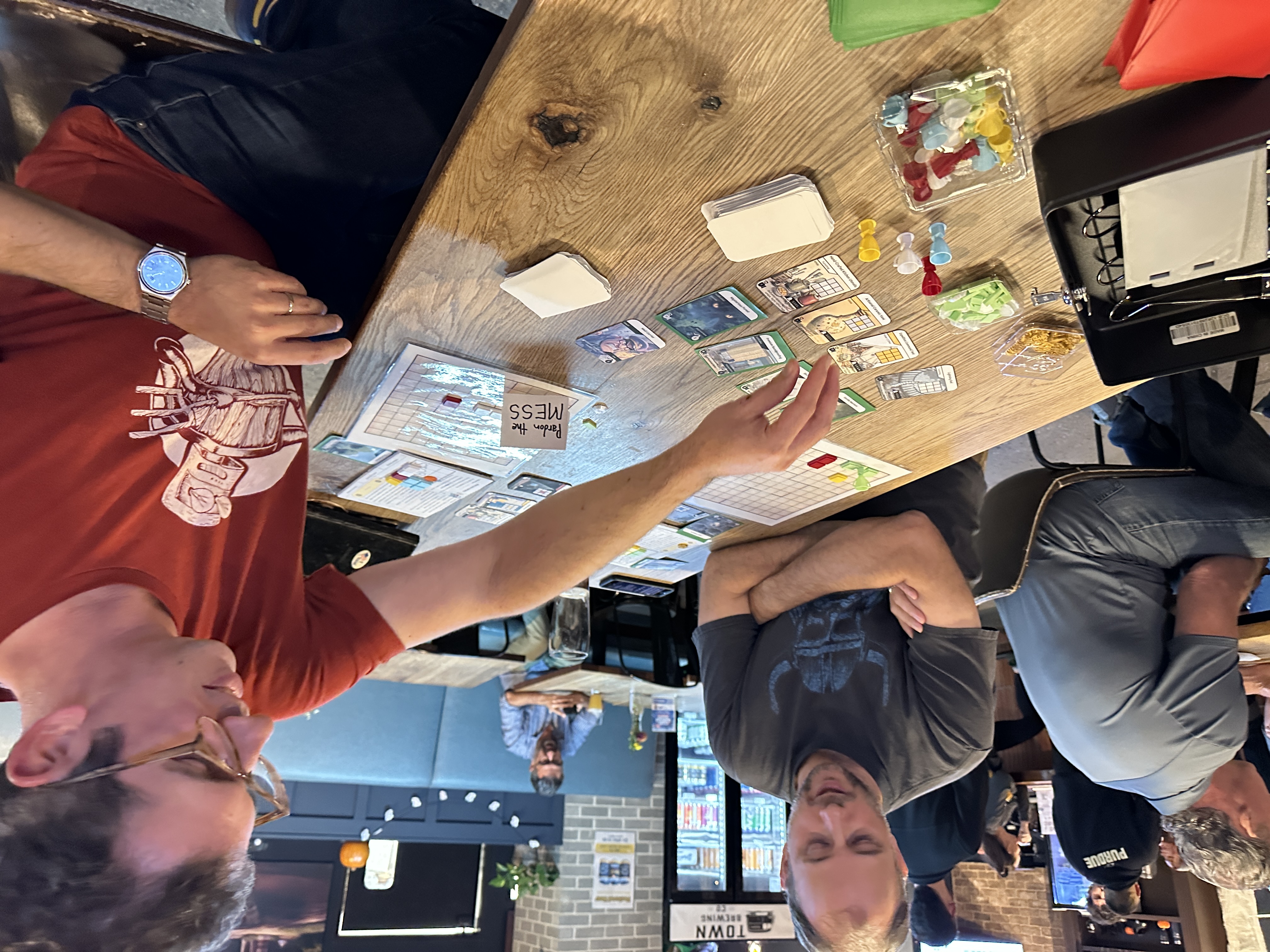 Two very generous game designers playtesting my prototype